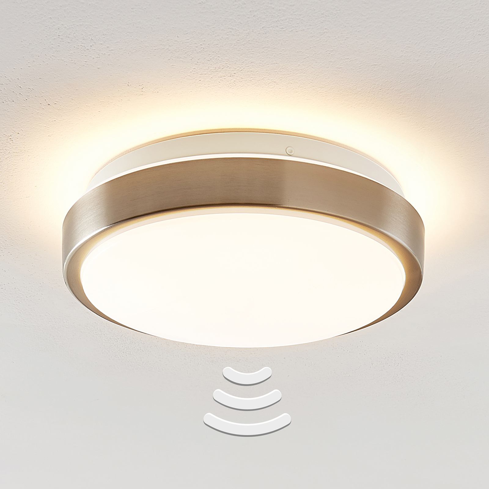 Lindby Camille LED-sensor-taklampa Ø26cm nickel