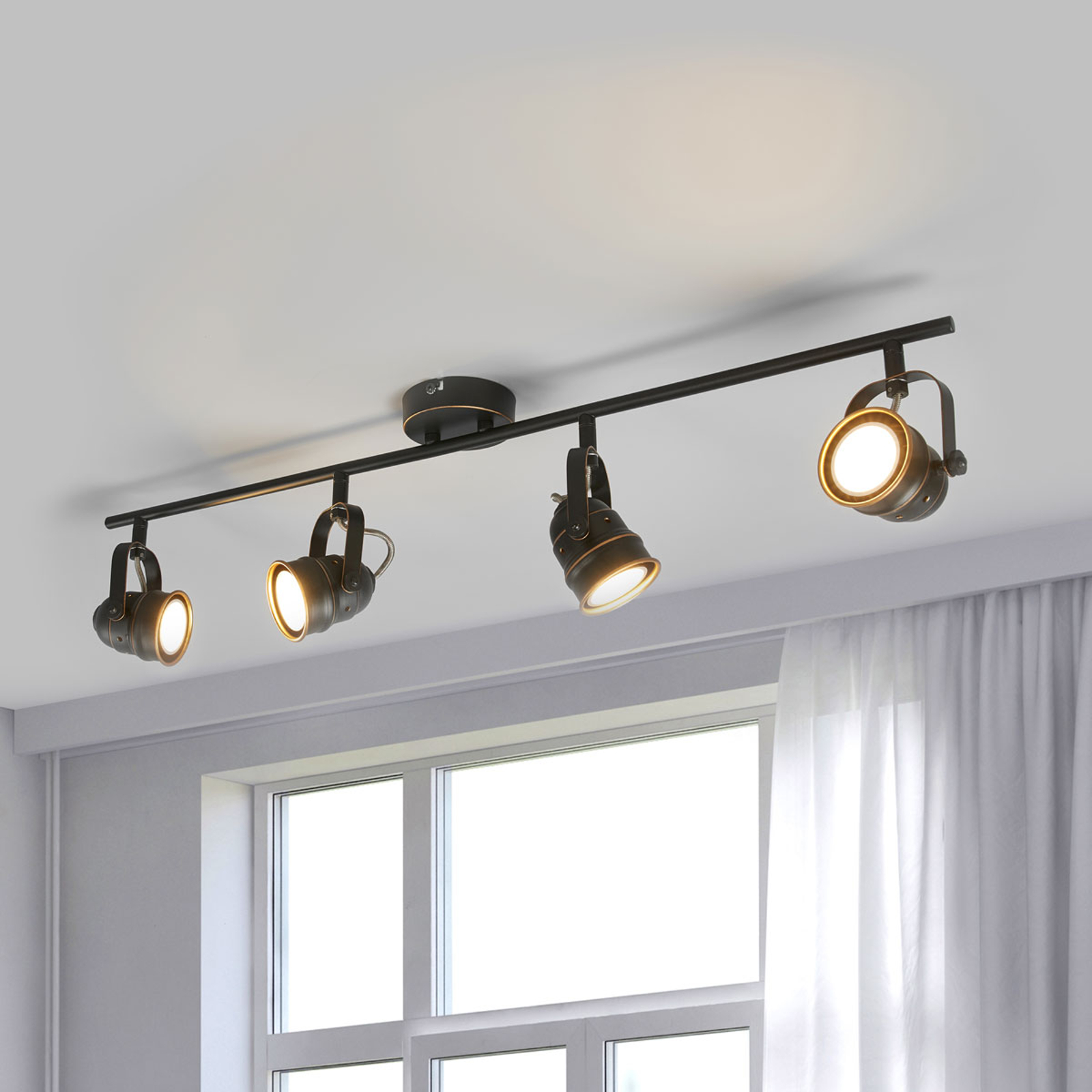 LED-vägglampa Leonor i svart-guld, fyra ljuskällor