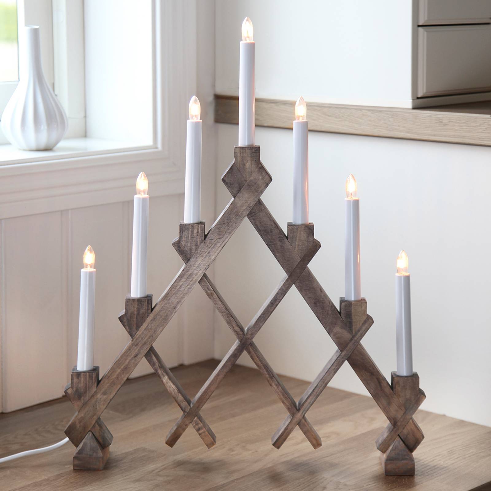 Sju ljuskällor ljusstake Rut brun