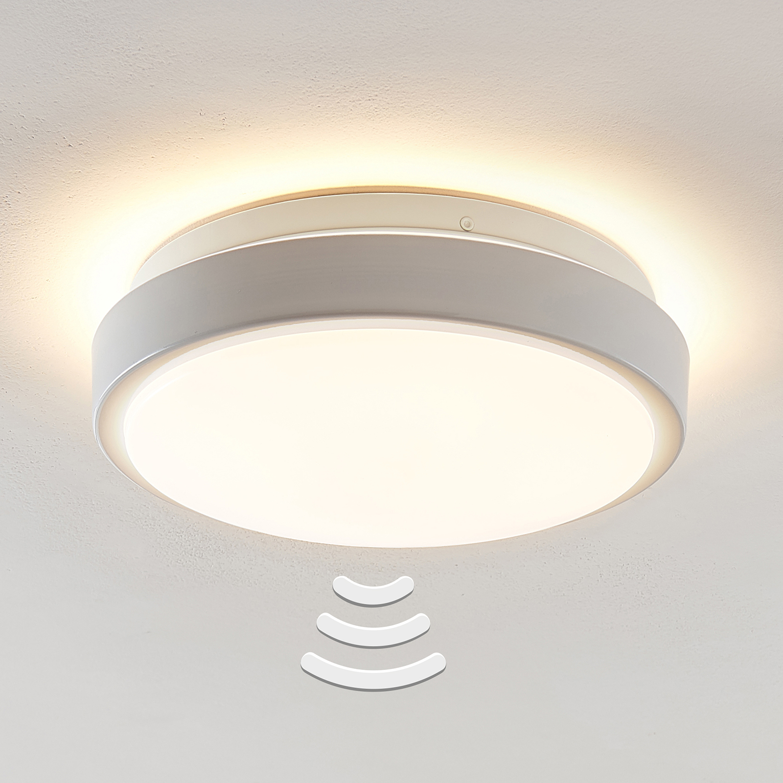 Lindby Camille LED-sensor-taklampa Ø26 cm vit