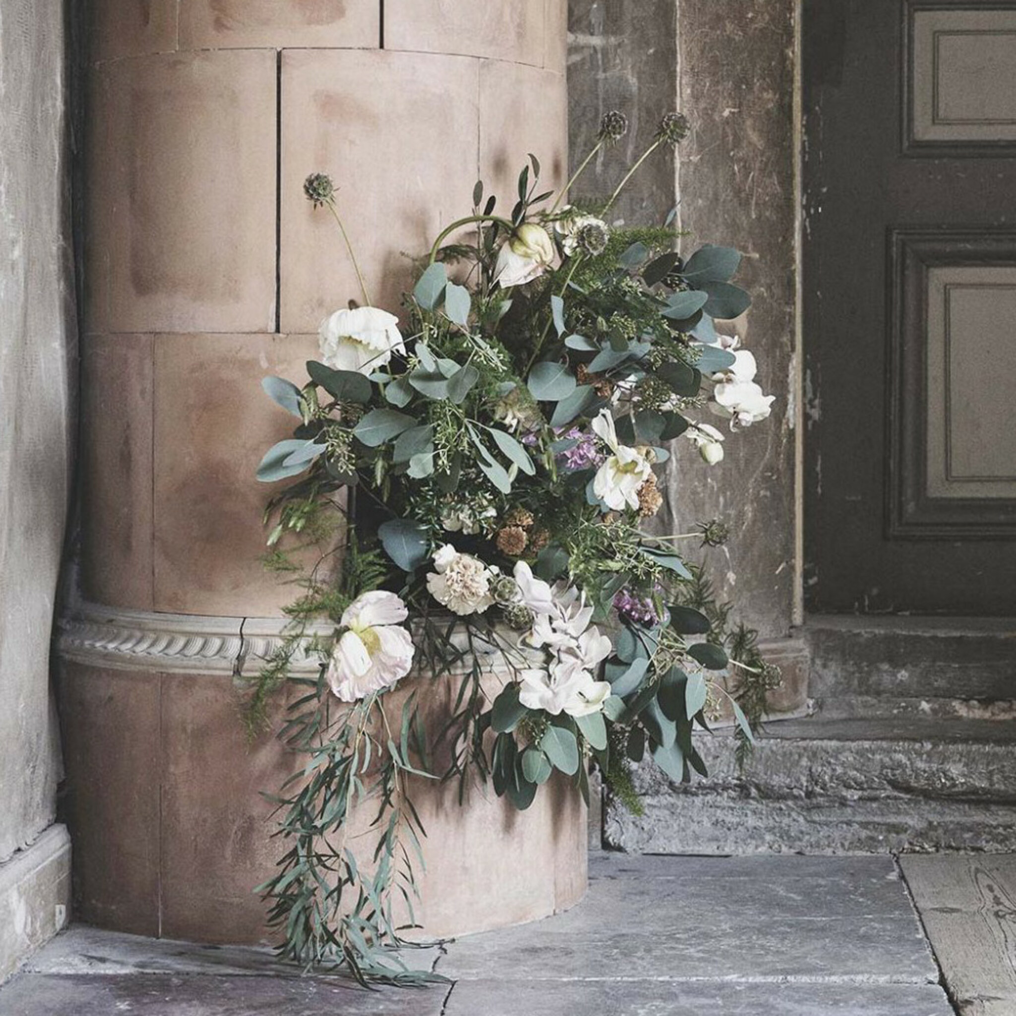 Flowers And Tiled Stove Poster